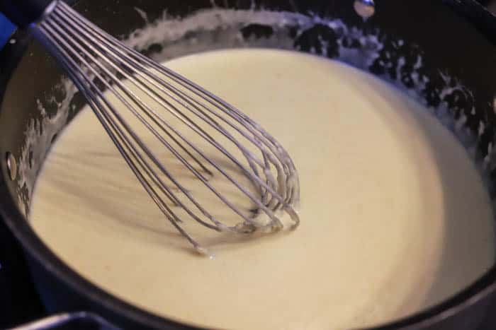 cream and butter in a pot for pumpkin pasta