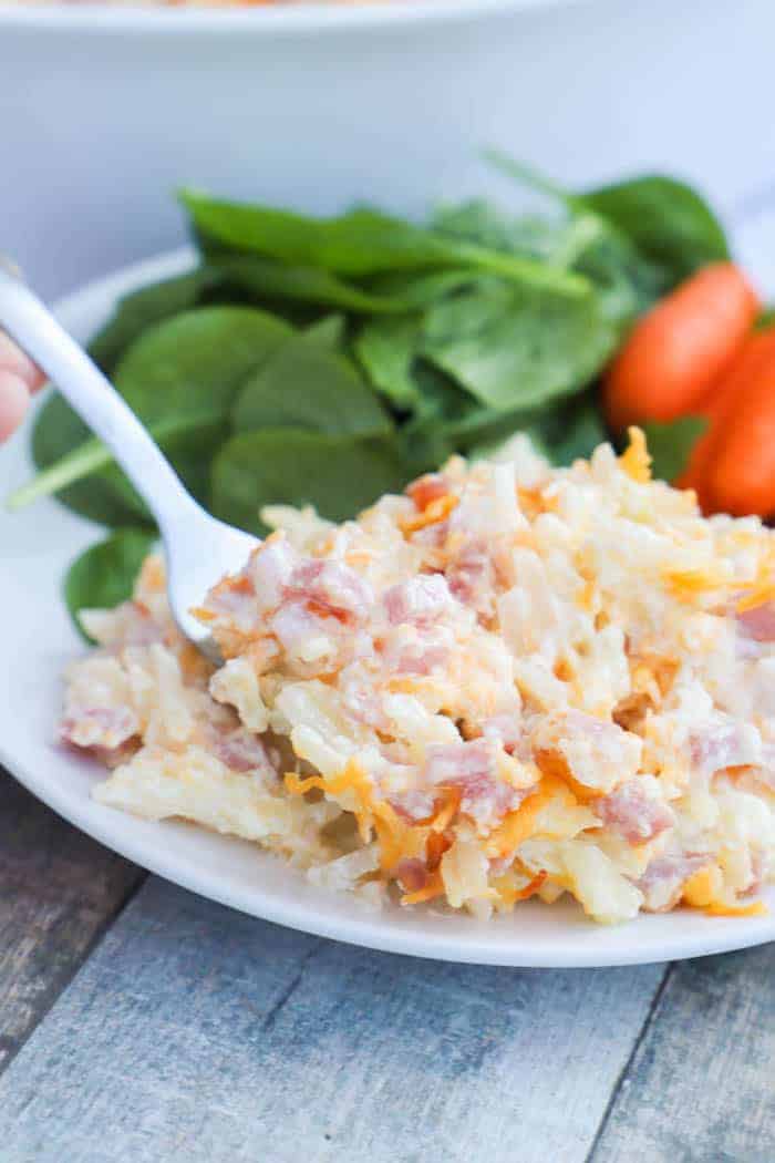 Cheesy Ham and Potato Casserole with a fork