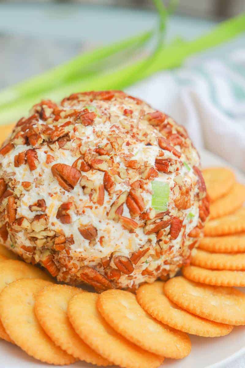 Classic Cheese Ball on a plate with crackers
