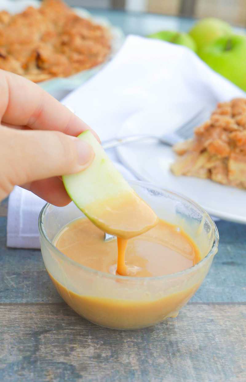 Homemade Caramel Sauce with an apple slice
