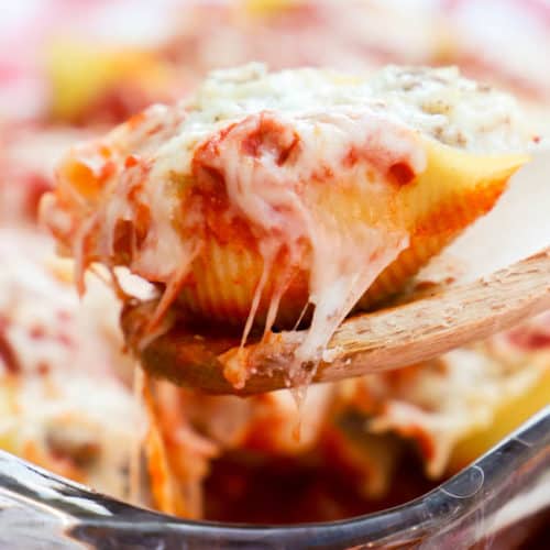 Lasagna Stuffed Shells on a wooden spoon