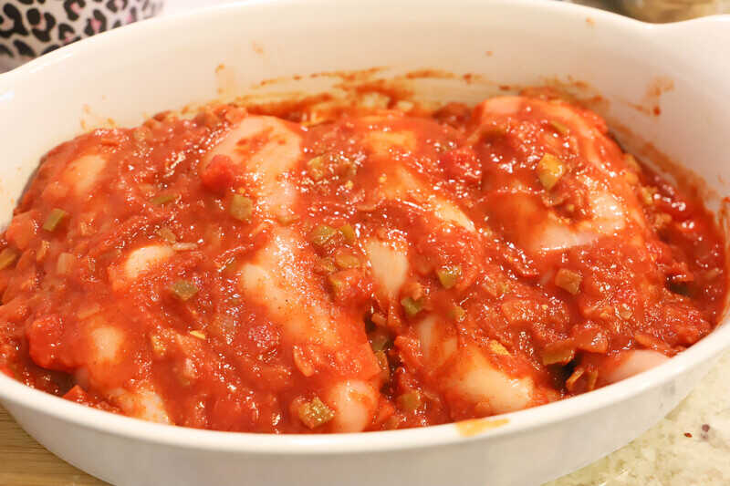 Salsa Chicken in a casserole dish before baking