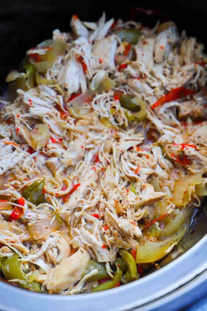 Slow Cooker Philly Chicken Cheesesteak shredded in the slow cooker