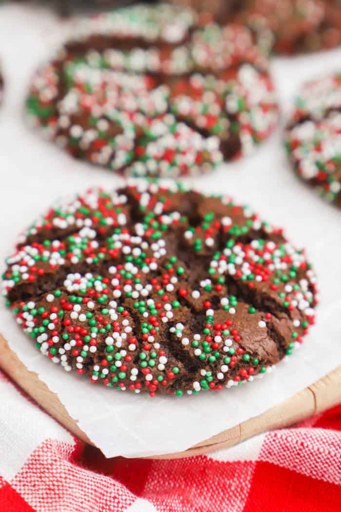 Chocolate Christmas Sprinkle Cookies on a board