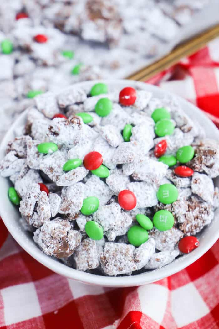 Christmas Puppy Chow in a white bowl