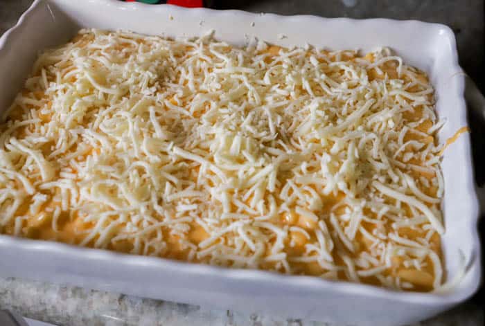 Creamy Mac and Cheese Casserole topped with shredded mozzarella