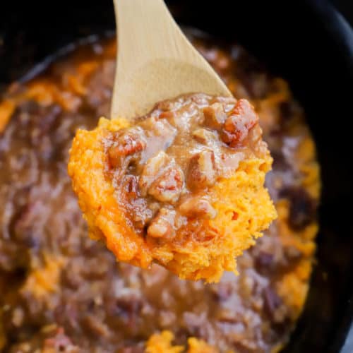 Slow Cooker Sweet Potato Casserole on a wooden spoon