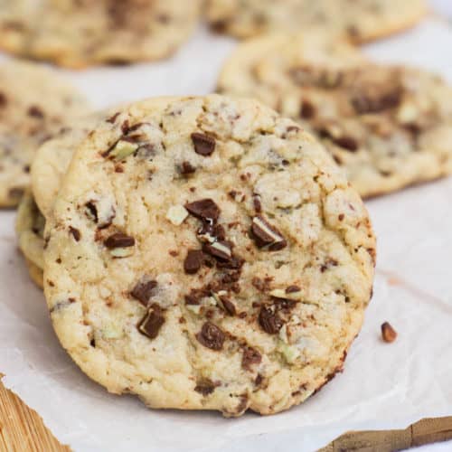 Mint Chocolate Chip Andes Cookie on a cutting board under green napkin