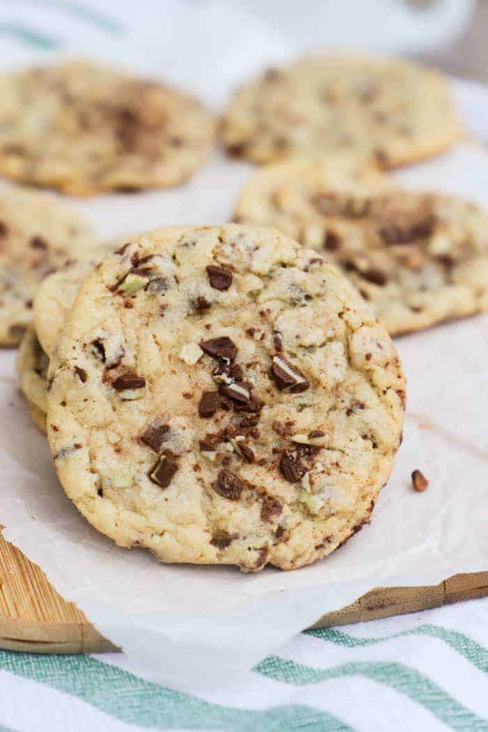 Mint Chocolate Chip Andes Cookie on a cutting board under green napkin