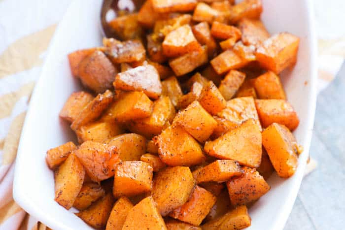 Roasted Butternut Squash in a white bowl.