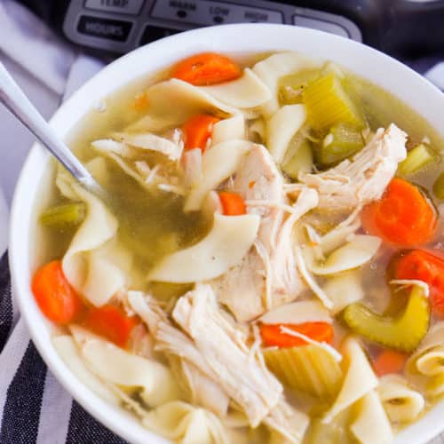 Slow Cooker Chicken Noodle Soup in a white bowl