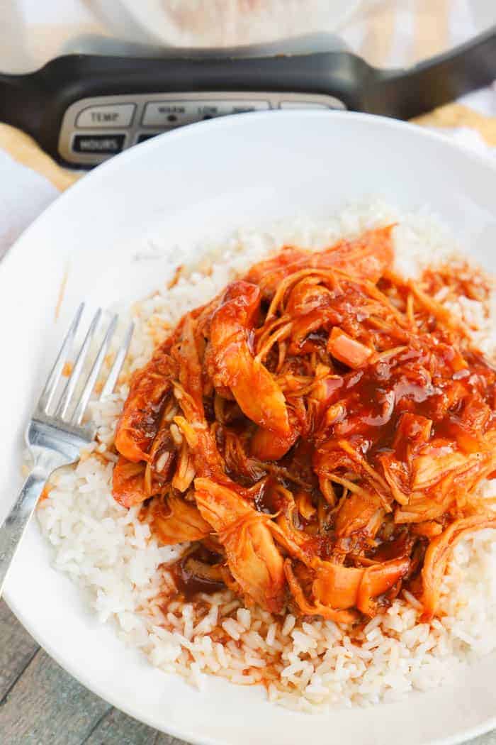 Slow Cooker Orange Chicken in a white bowl