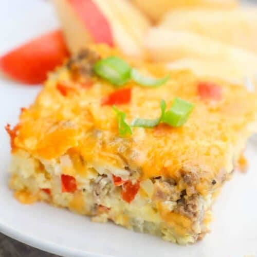 Make Ahead Breakfast Casserole on a white plate with apples