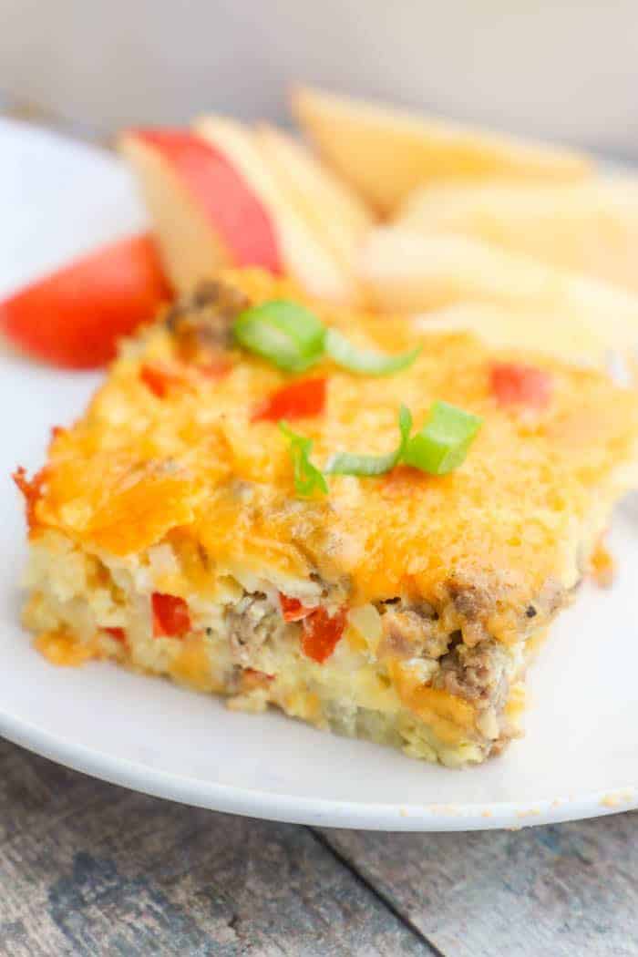 Make Ahead Breakfast Casserole on a white plate with apples