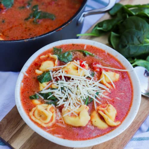 Creamy Tomato Tortellini Soup Recipe in a white bowl