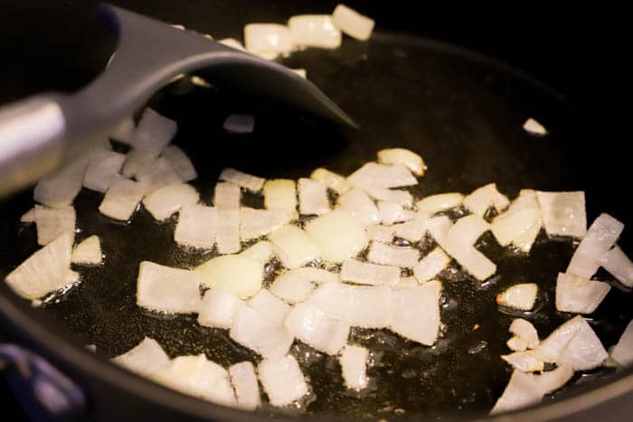 cooking onions in a pot