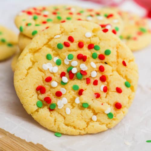 Yellow Cake Batter Christmas Cookies on a wooden cutting board