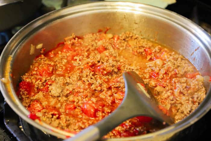 cooking ground beef in the pot