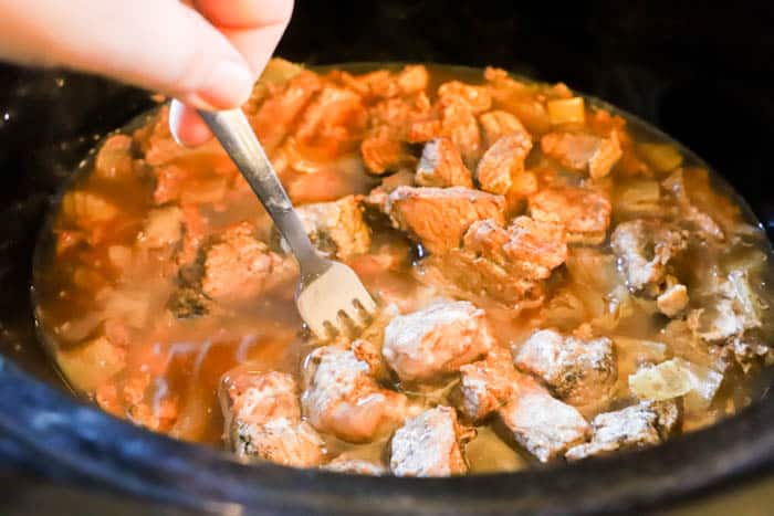 mixing slow cooker ingredients 