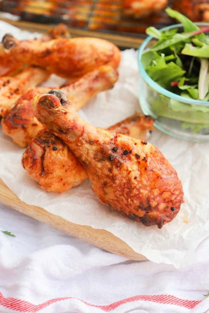 Baked Honey Garlic Chicken Legs with a side salad
