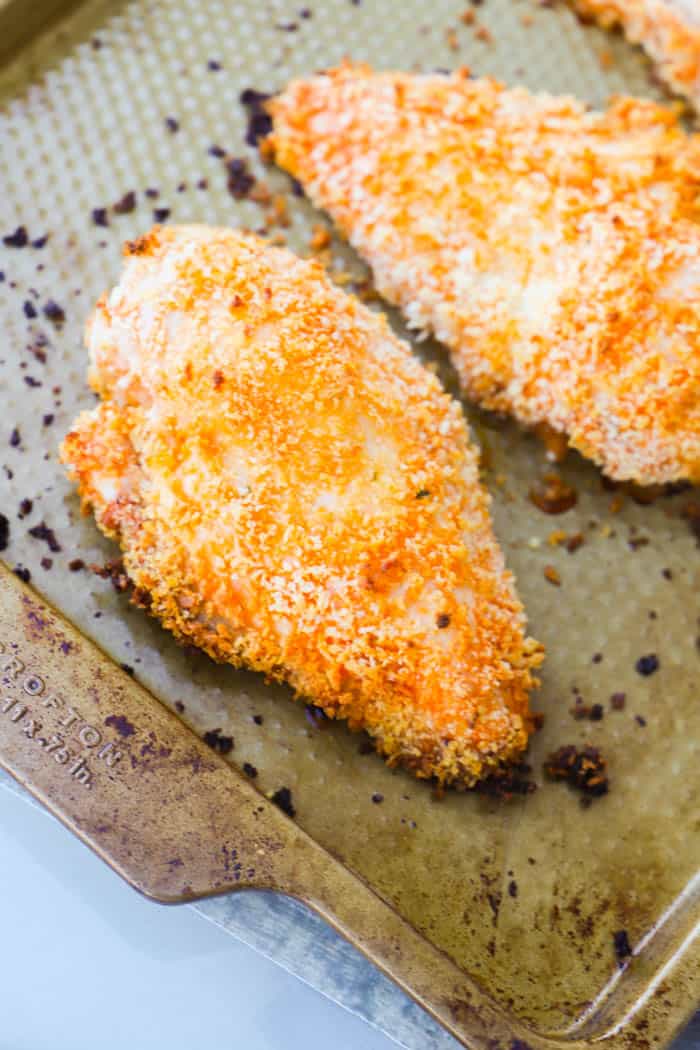 Crispy Baked Buffalo Chicken on a baking sheet