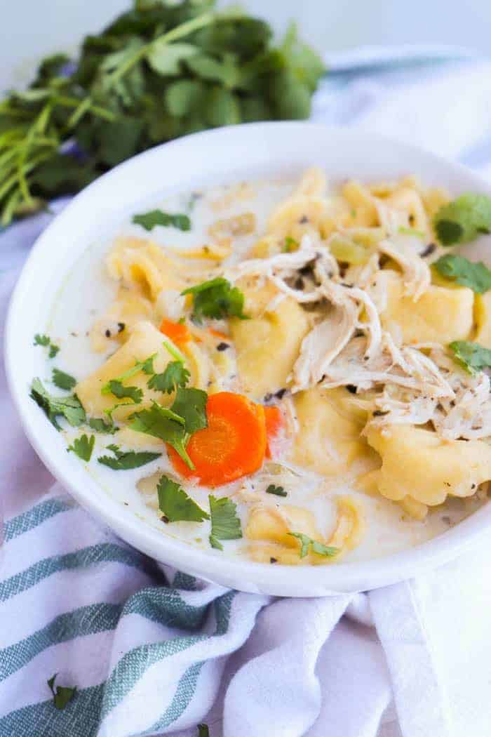 Slow Cooker Creamy Chicken Tortellini Soup in a bowl