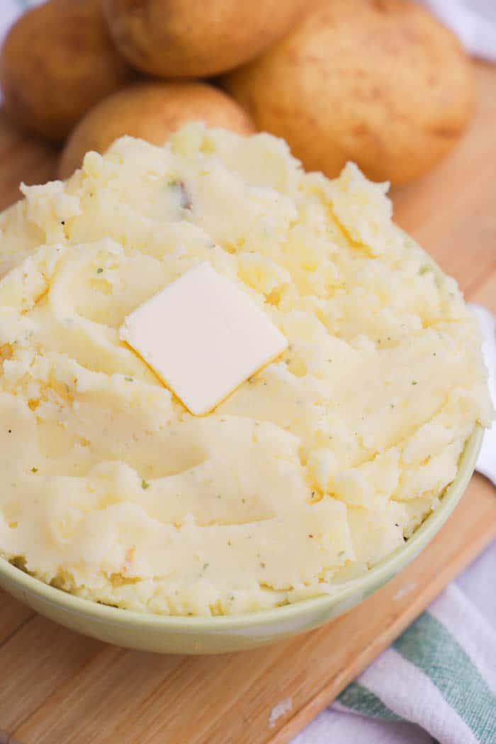 Sour Cream and Ranch Mashed Potatoes in a green bowl 