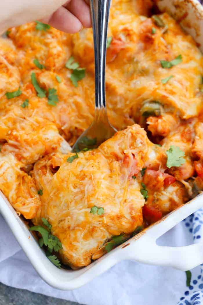 Chicken Fajita Bubble Up Bake in a casserole dish with a spoon