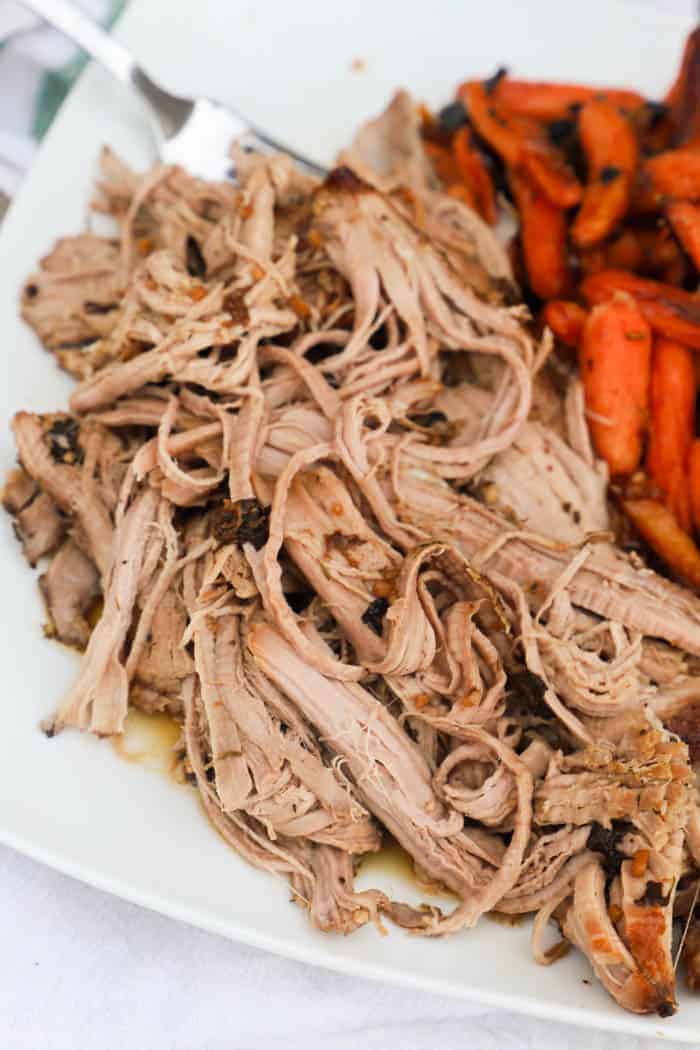 Balsamic and Brown Sugar Pork Tenderloin on a white plate