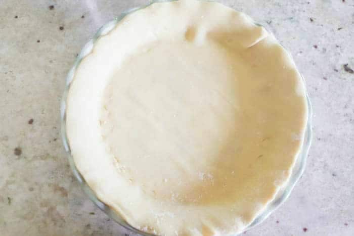 pie crust dough in pie pan for bottom of pot pie