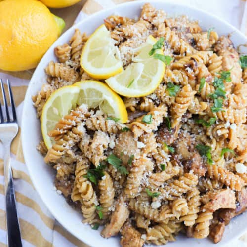 Parmesan Lemon Pasta and Chicken in a white bowl