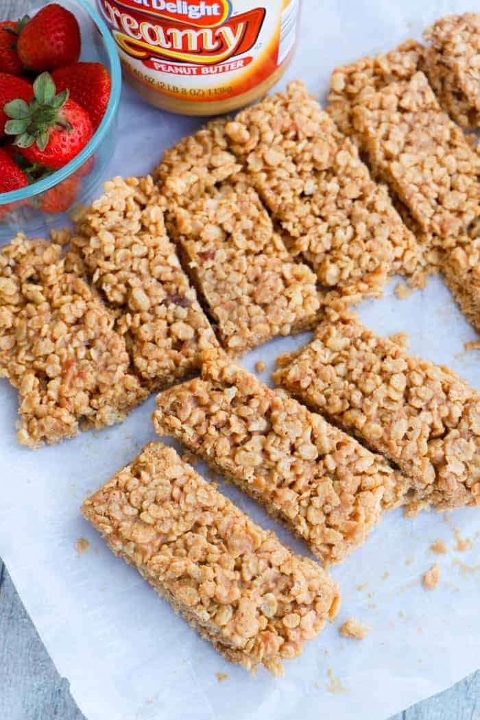 Peanut Butter and Jelly Rice Krispies Breakfast Bar on parchment paper