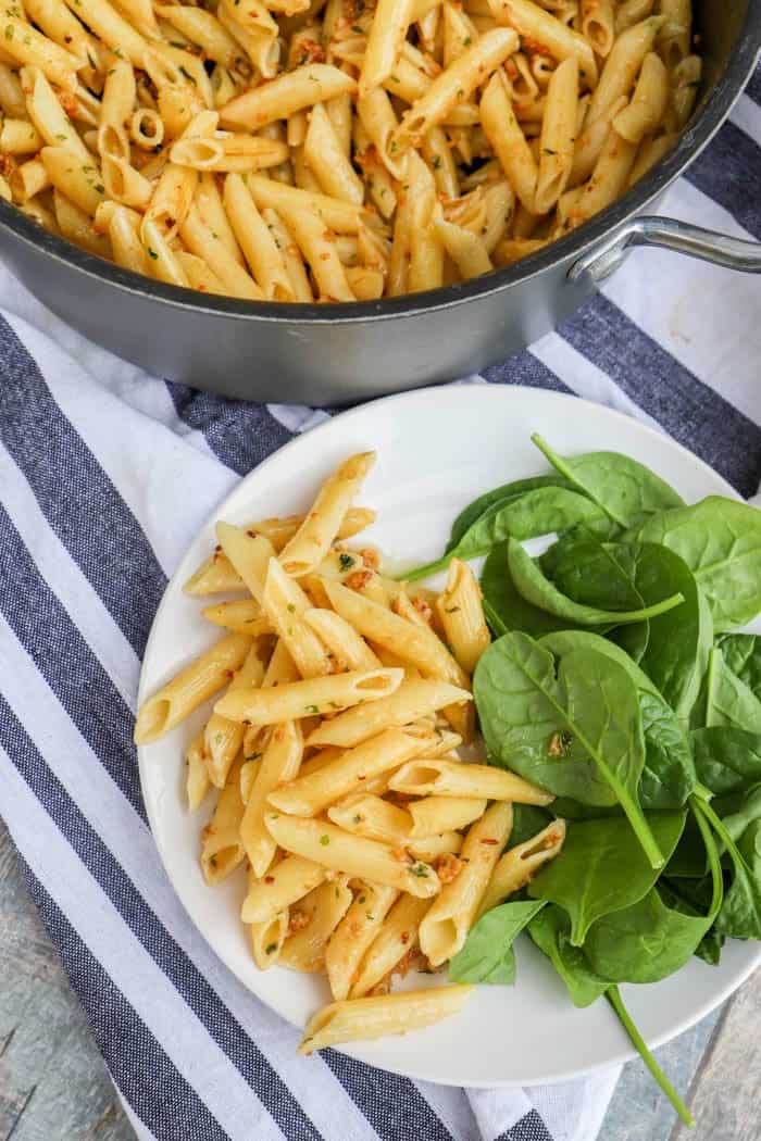 5 Ingredient Parmesan Garlic Penne on a plate with salad