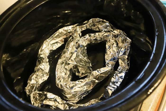adding foil to the bottom of the slow cooker