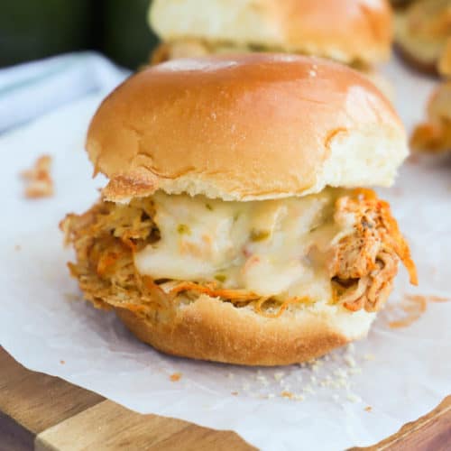 Slow Cooker Chicken Fajita Sliders on a cutting board