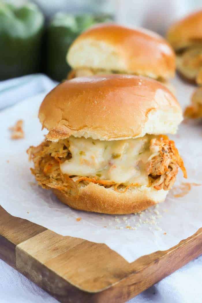 Slow Cooker Chicken Fajita Sliders on a cutting board