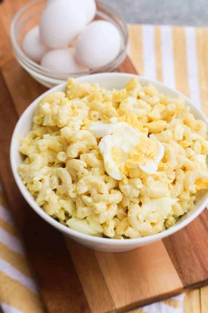 Deviled Egg Pasta Salad in a white bowl.