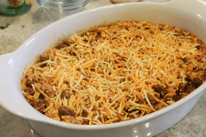 topping casserole with cheese