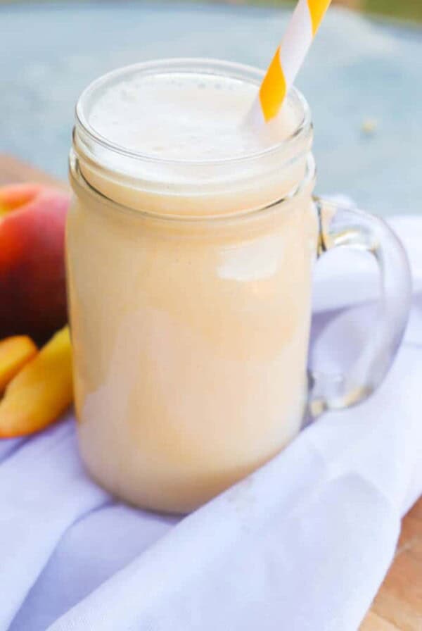 peach smoothie in a mason jar