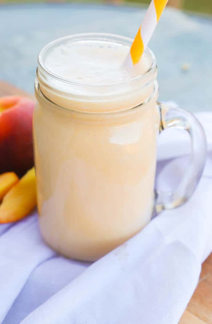 peach smoothie in a mason jar