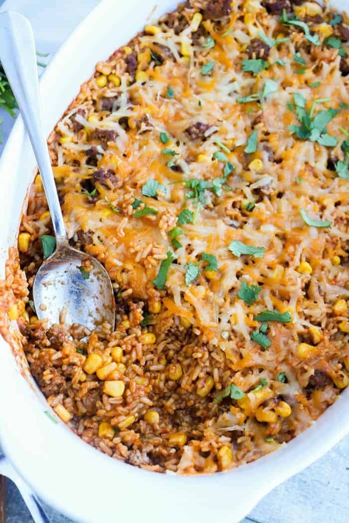 Beef Enchilada Casserole in a white casserole dish