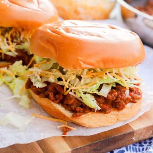 Taco Sloppy Joes on a wooden serving plate