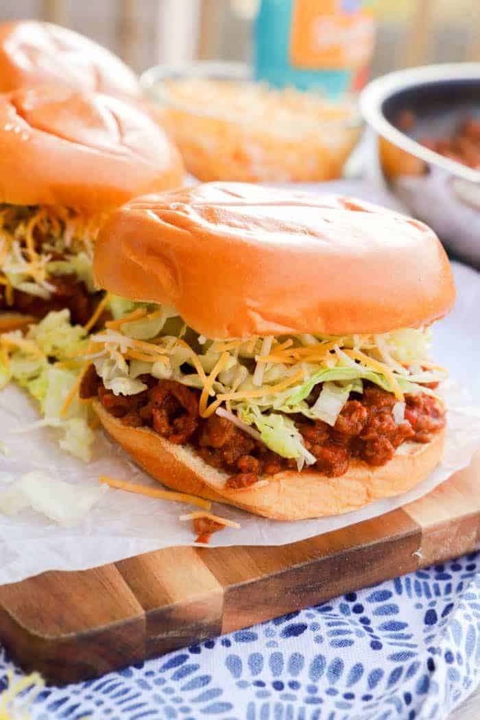 Taco Sloppy Joes on a wooden serving plate