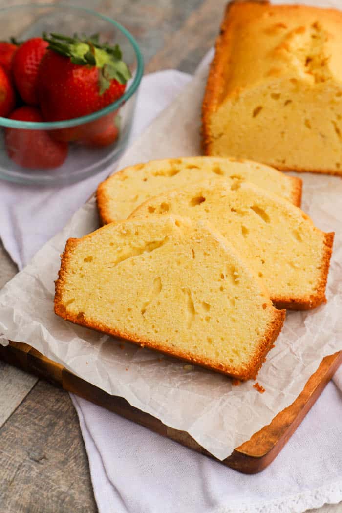 Million Dollar Pound Cake on a wooden cutting board.