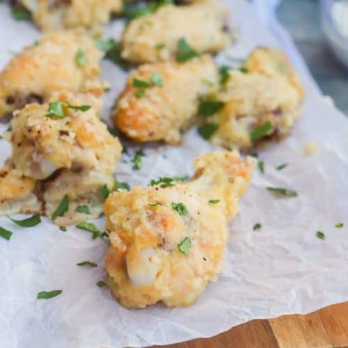 Parmesan Garlic Wings on a wood serving tray