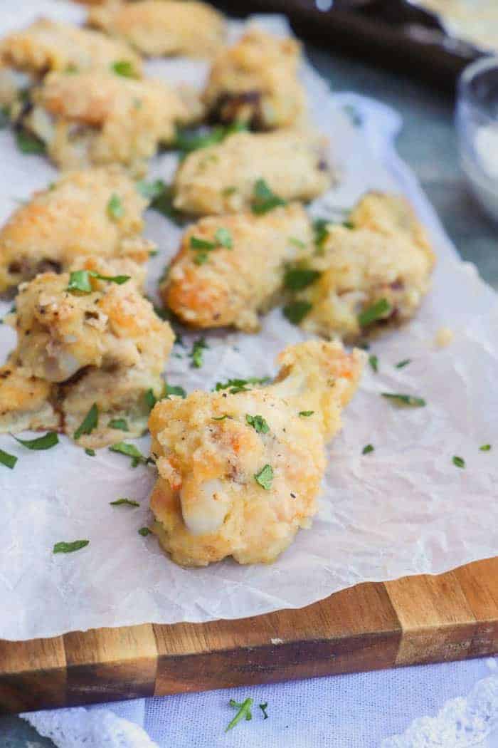 Parmesan Garlic Wings on a wood serving tray