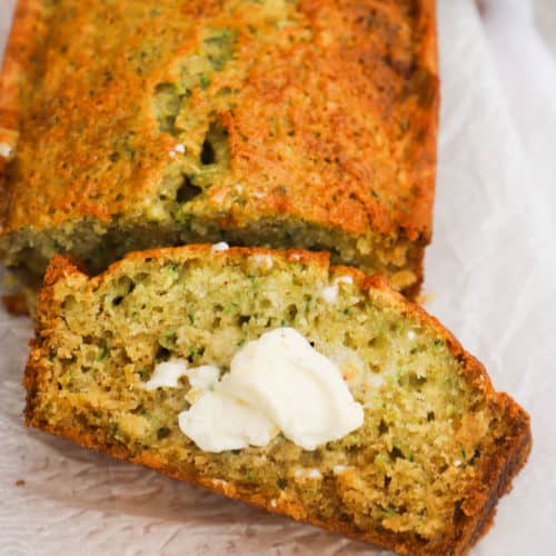 Zucchini Bread sliced with butter