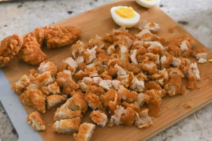 diced chicken on a cutter board