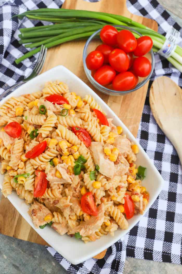 top view picture of BBQ Chicken Pasta Salad with tomatoes and green onions