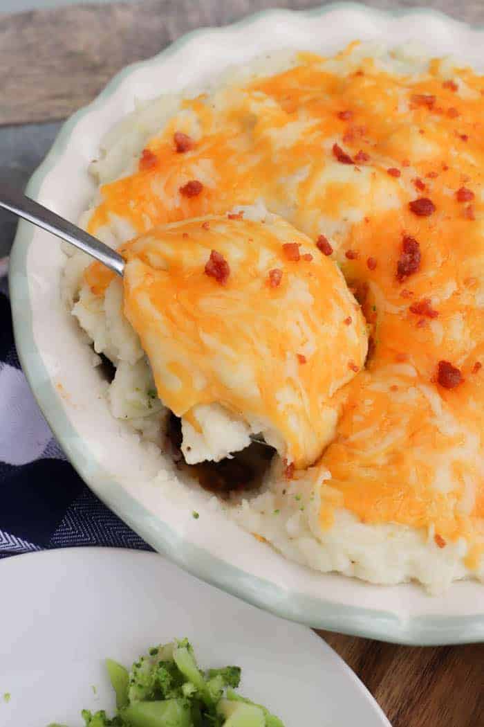 Bacon Cheeseburger Shepherd's Pie with metal spoon